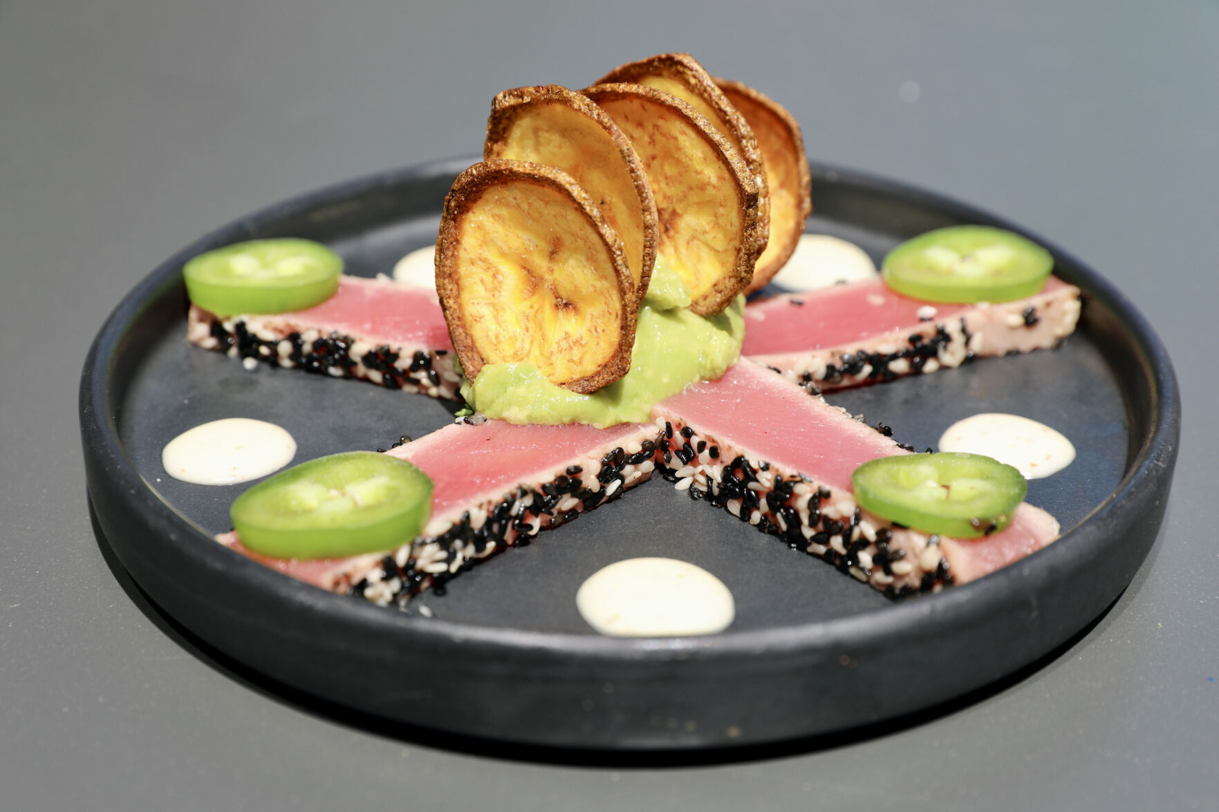 Tuna crudo with avocado and truffle alioli at Botica.